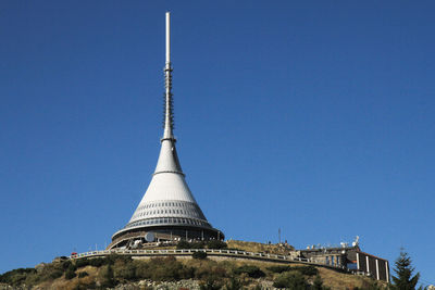 Low angle view of building against blue sky