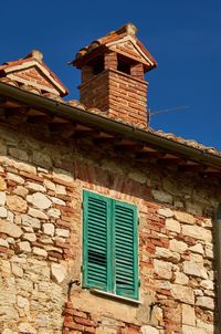 Low angle view of house against sky