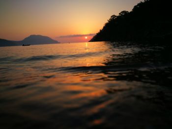 Scenic view of sea at sunset