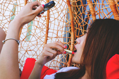 Side view of young woman looking away