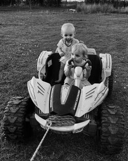 Portrait of brother and sister going for a ride