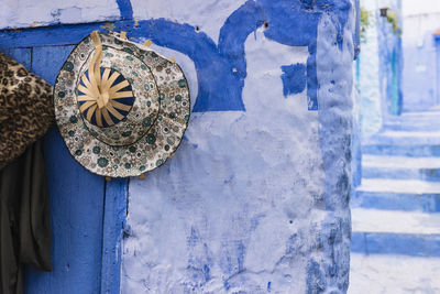 Close-up of old weathered door on building wall