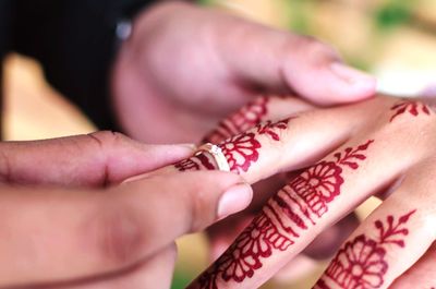 Close-up of woman holding hands
