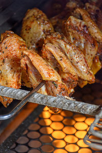 High angle view of meat on barbecue grill