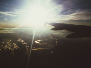 Sun shining through clouds