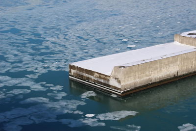 High angle view of ice floating on sea