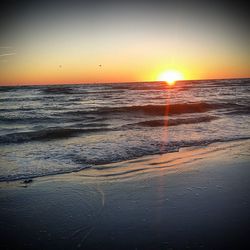 Scenic view of sea at sunset