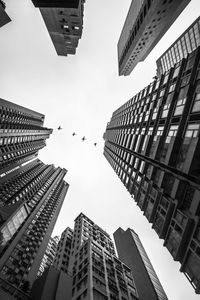Low angle view of buildings against clear sky
