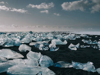 Scenic view of frozen sea against sky