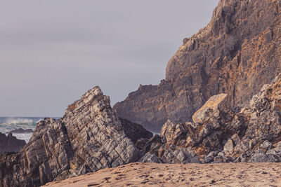 Scenic view of rocky mountains against sky