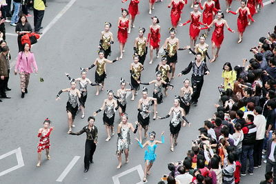 High angle view of chinese new year parade on street in city