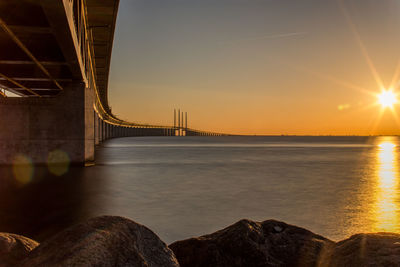 View of bridge over river in city