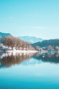 Picturesque village on the coast of the lake tegernsee. alpine mountains, bavaria, germany