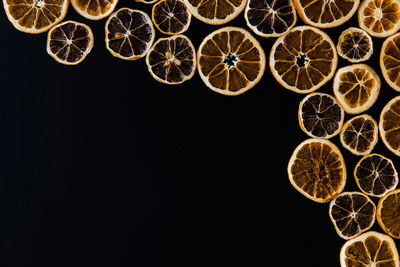 Low angle view of drink against black background