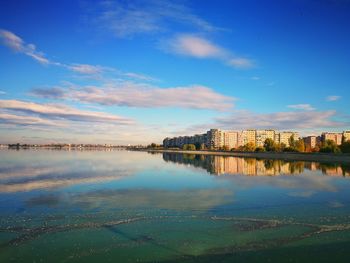 Scenic view of lake against blue sky