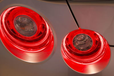 High angle view of red wine on glass table