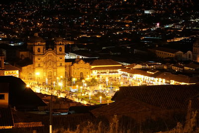 High angle view of illuminated buildings in city