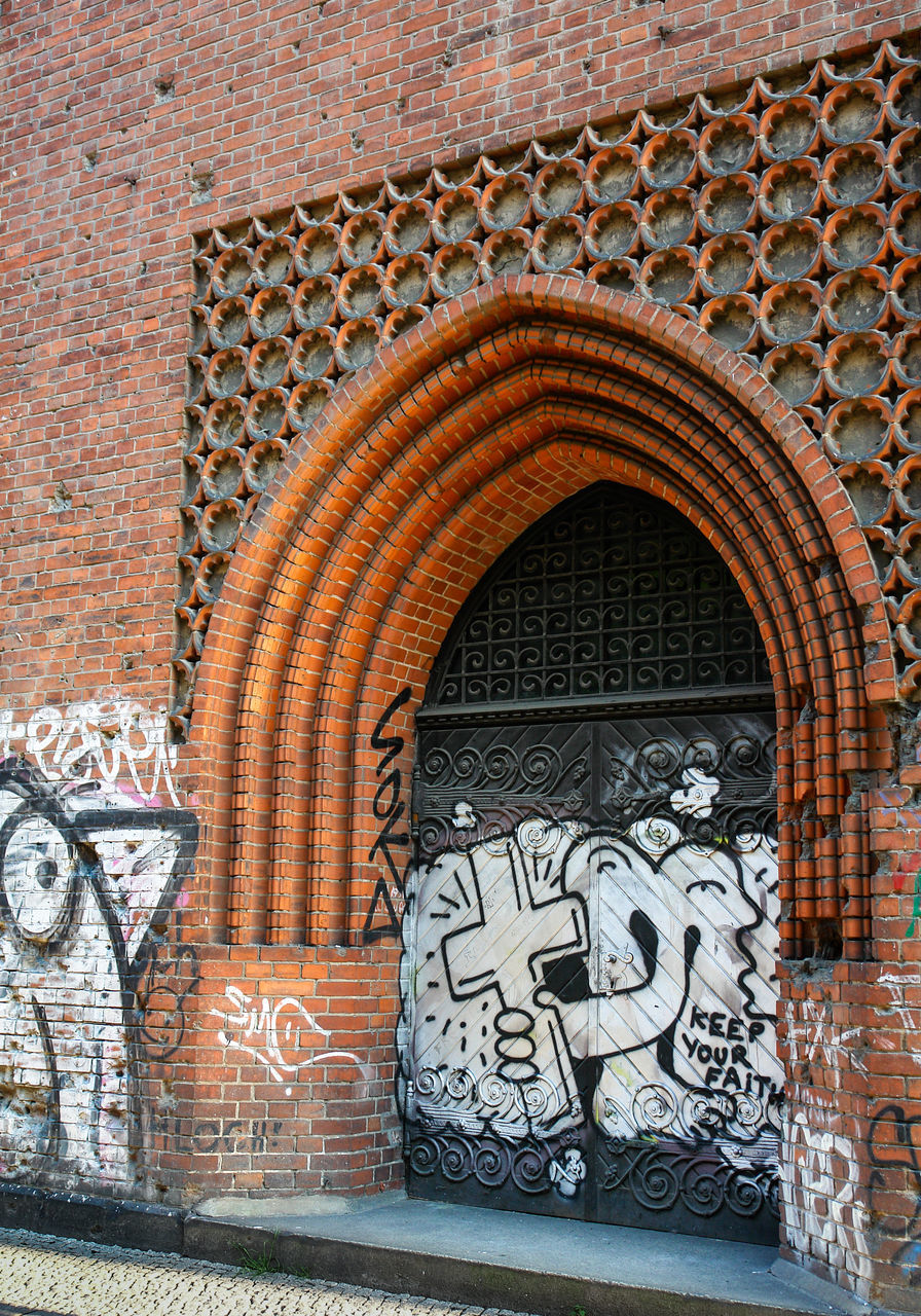 architecture, built structure, creativity, art and craft, building exterior, wall, brick wall, brick, arch, graffiti, no people, wall - building feature, building, day, text, craft, pattern, representation, design, communication, ornate, mural