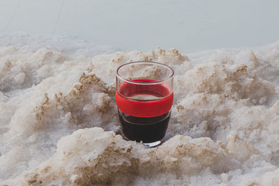 High angle view of red wine in glass