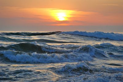 Scenic view of sea against sky during sunset