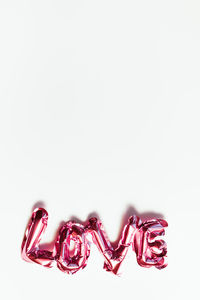 Close-up of cake against white background