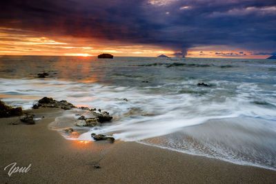 Scenic view of sea against sky during sunset