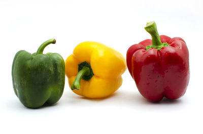 Close-up of fruits against white background