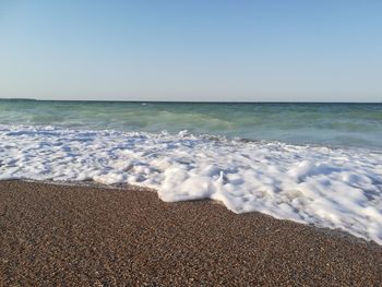 Scenic view of sea against clear sky