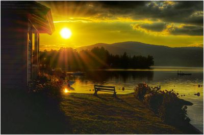 Scenic view of lake at sunset