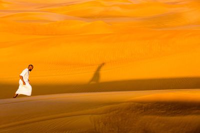 People relaxing on sand