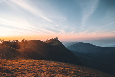 Scenic view of mountains against sky during sunset