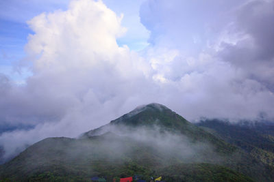 Scenic view of volcanic mountain against sky