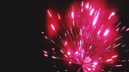 Firework display at night