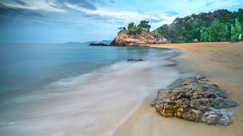 Scenic view of beach against sky