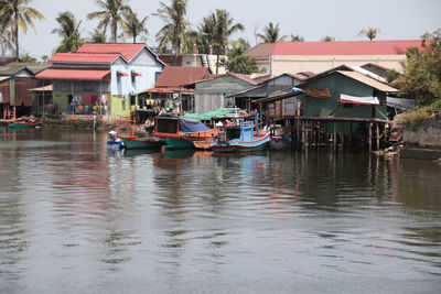 Houses built on the river owned by mostly local fishermen and their family in cambodia