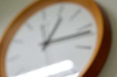 Close-up of clock on wall