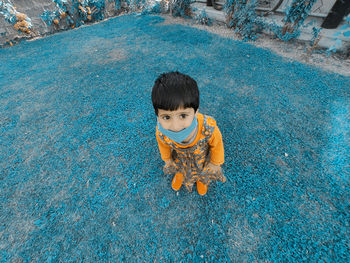 High angle portrait of cute boy outdoors