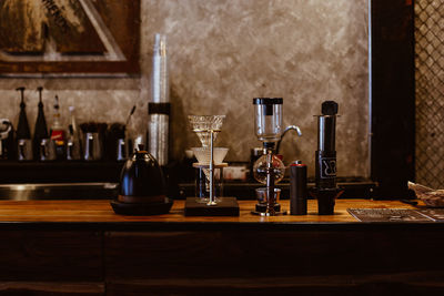 Close-up of wine bottles on table in restaurant