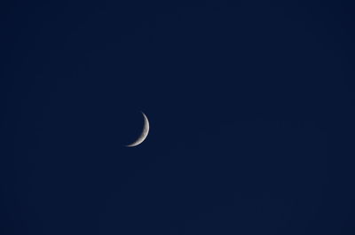 Low angle view of moon in sky