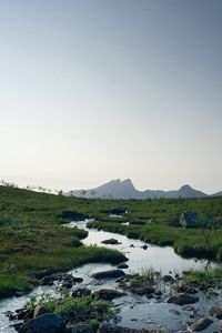 Scenic view of river against clear sky