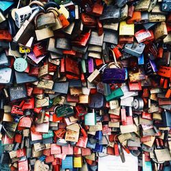 Full frame shot of padlocks hanging on metal