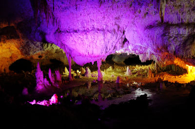 Dramatic sky over cave