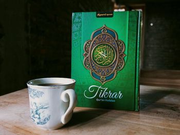 Close-up of coffee cup on table