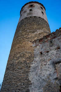 Low angle view of old ruin against clear sky