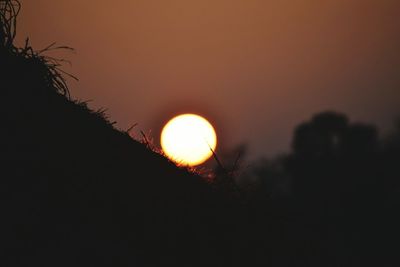 Low angle view of sun during sunset