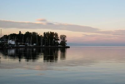 Scenic view of sea against sky at sunset