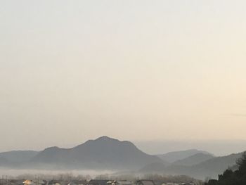 Scenic view of mountains against clear sky