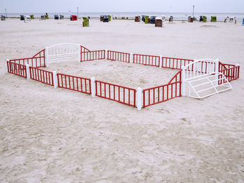 View of chairs on beach