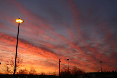 Low angle view of cloudy sky at sunset