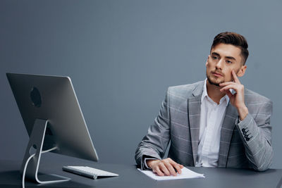 Businessman brainstorming in office